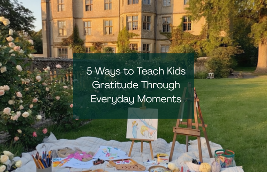 A picnic blanket full of arts and crafts in front an estate with a blog title over it