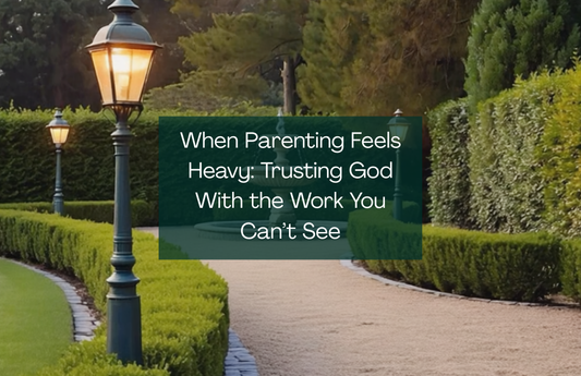 A driveway leading to an entrance of an estate with a blog title on it