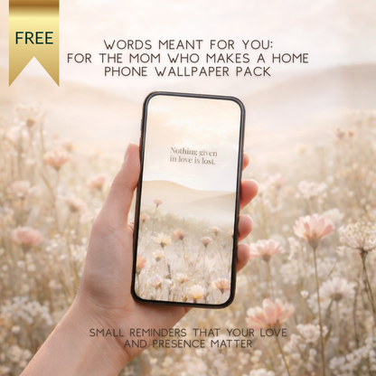 Hand holding a phone with a wallpaper pack featuring nature-themed quotes, set against a blurred floral background.